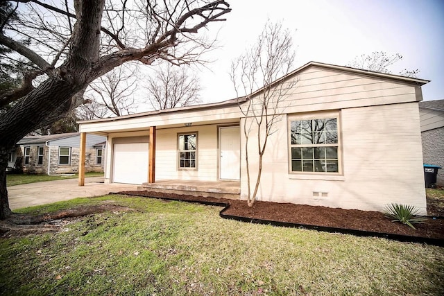 view of front facade featuring a front lawn, a porch, and a garage