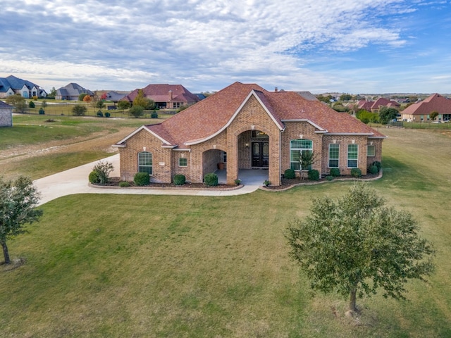 view of front of home with a front yard