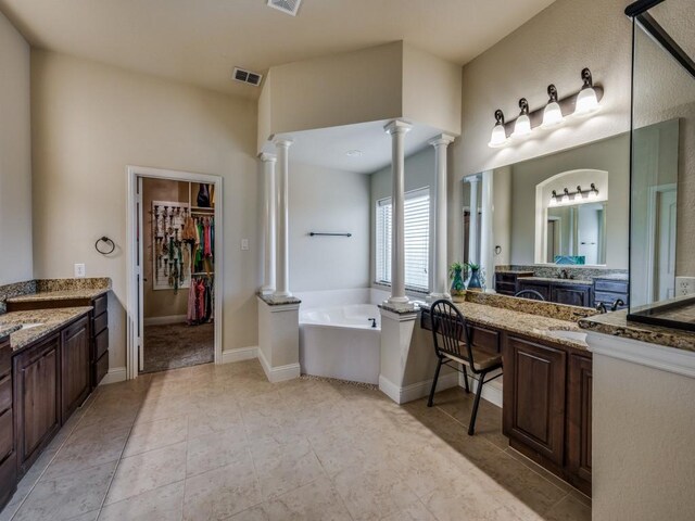 carpeted bedroom with ceiling fan, ornamental molding, and a tray ceiling