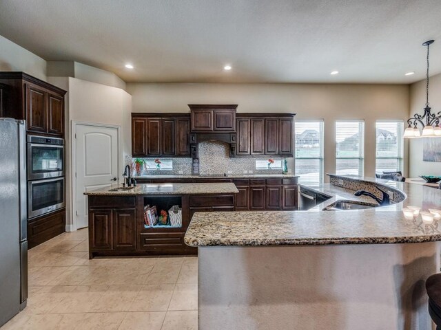 dining space with crown molding, dark hardwood / wood-style flooring, an inviting chandelier, and french doors