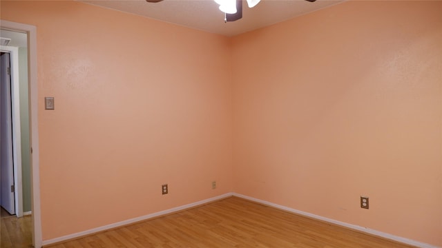 unfurnished room with ceiling fan and light hardwood / wood-style flooring