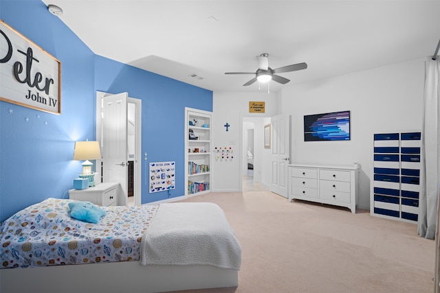 bedroom featuring ceiling fan and light carpet