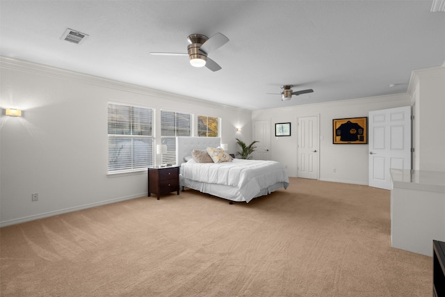 bedroom with crown molding, light colored carpet, and ceiling fan