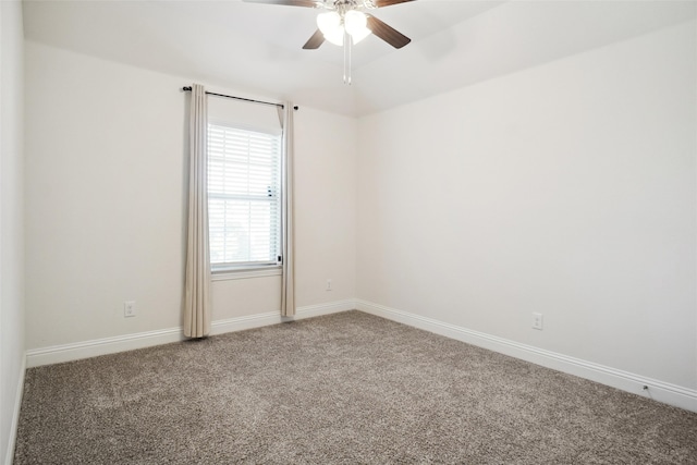 empty room with ceiling fan and carpet flooring