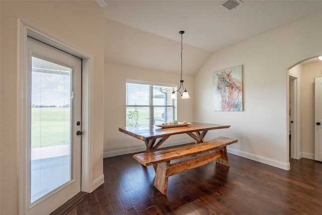 dining area with dark wood-type flooring, vaulted ceiling, and breakfast area