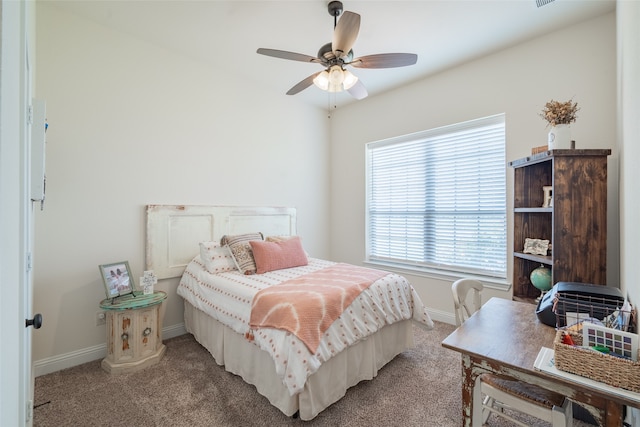 carpeted bedroom with ceiling fan