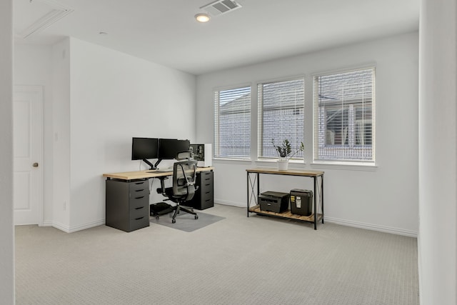 office space featuring light carpet