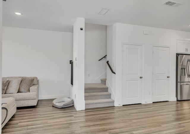 living room featuring light wood-type flooring