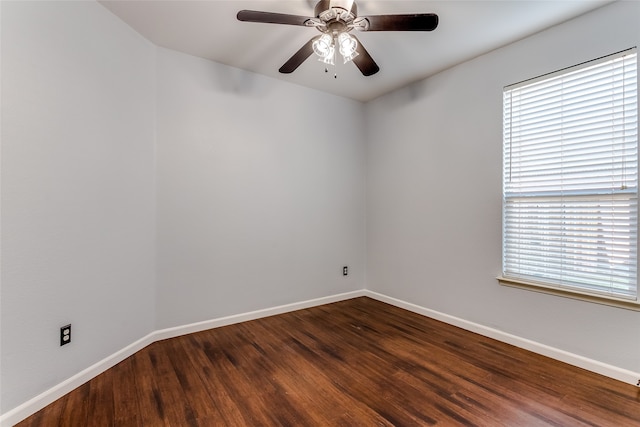 unfurnished room featuring hardwood / wood-style floors, ceiling fan, and a healthy amount of sunlight