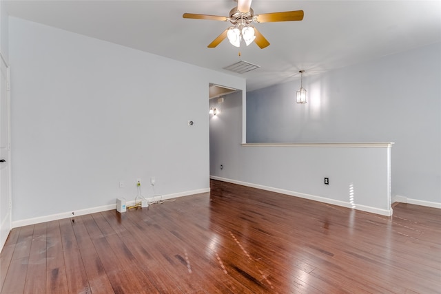 empty room featuring ceiling fan and wood-type flooring