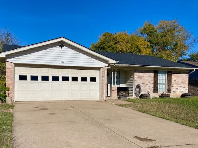 single story home with a garage