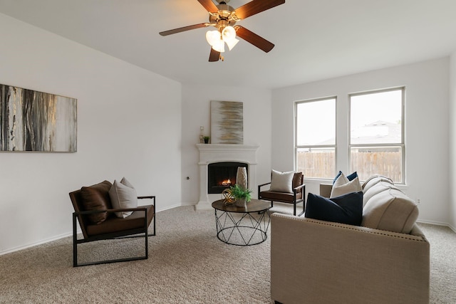 carpeted living room featuring ceiling fan