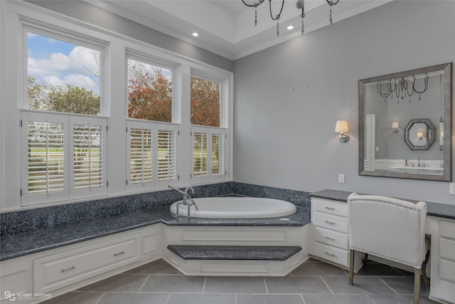 bathroom featuring vanity, a tub to relax in, crown molding, and tile patterned floors