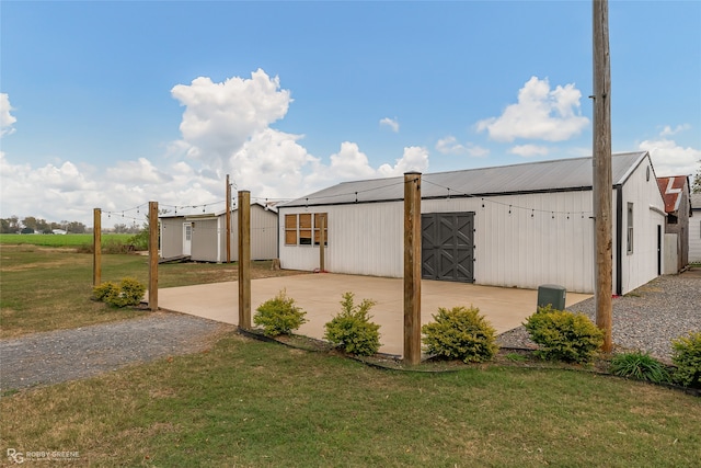 exterior space with an outbuilding