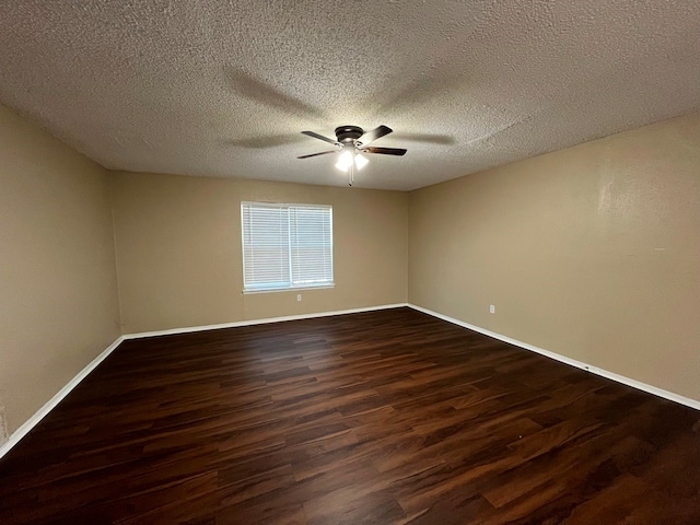 unfurnished room featuring a textured ceiling, ceiling fan, and dark wood-type flooring