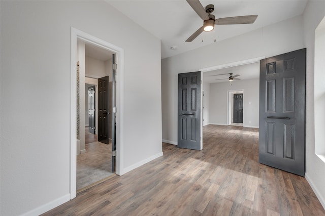 unfurnished room featuring wood-type flooring and ceiling fan