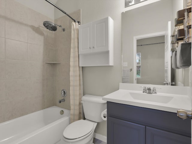 full bathroom featuring toilet, vanity, and shower / tub combo