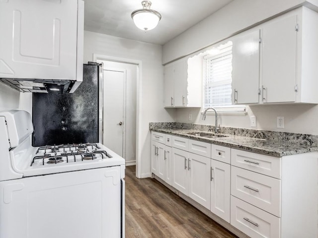 kitchen with sink, white cabinets, white range with gas stovetop, and dark hardwood / wood-style floors