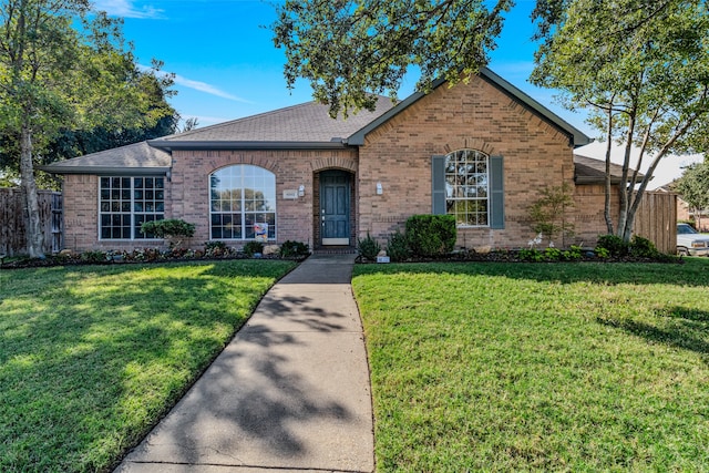 view of front of house with a front lawn