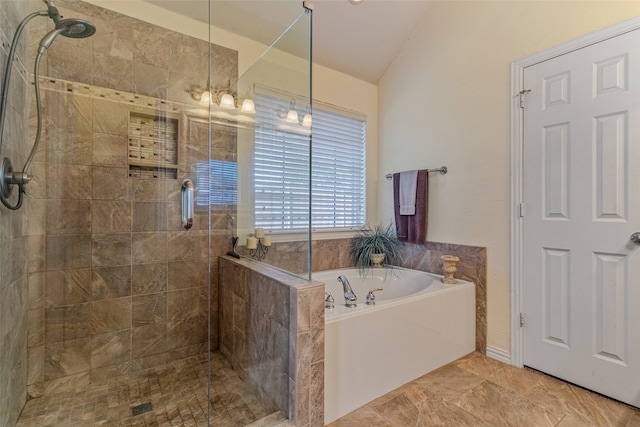 bathroom with separate shower and tub and lofted ceiling