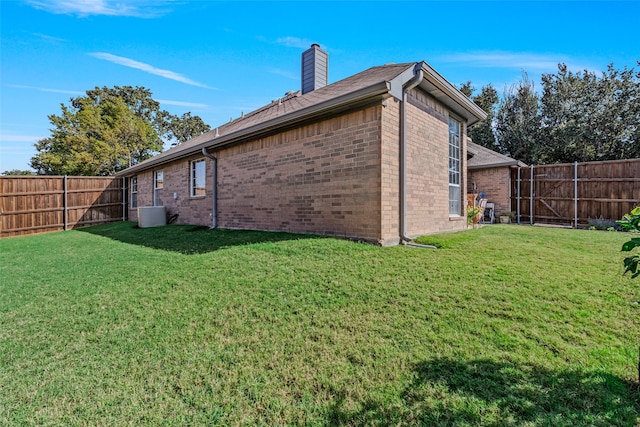 view of property exterior with a yard