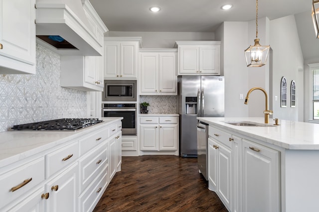 kitchen with backsplash, premium range hood, sink, dark hardwood / wood-style floors, and appliances with stainless steel finishes