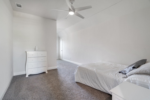 bedroom featuring dark carpet and ceiling fan