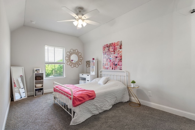 carpeted bedroom featuring ceiling fan and vaulted ceiling