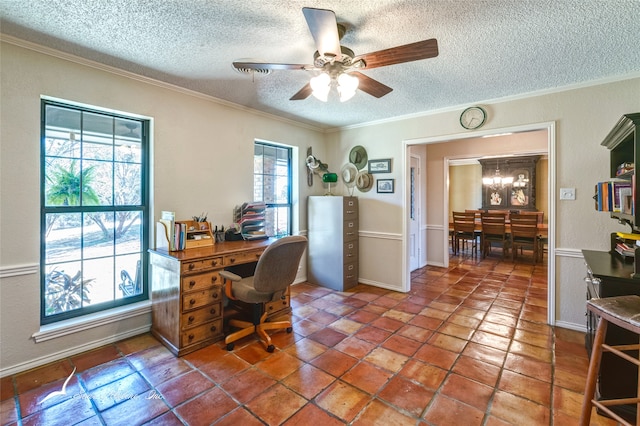 office featuring crown molding, ceiling fan, and a textured ceiling