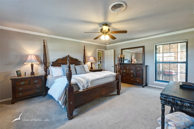 bedroom featuring light carpet, a textured ceiling, ceiling fan, and ornamental molding