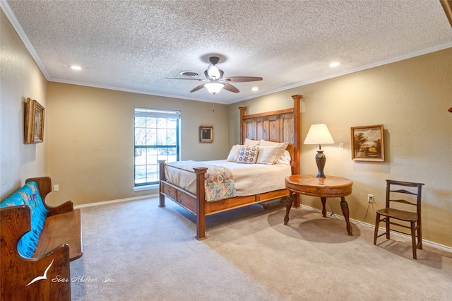 carpeted bedroom featuring a textured ceiling, ceiling fan, and crown molding