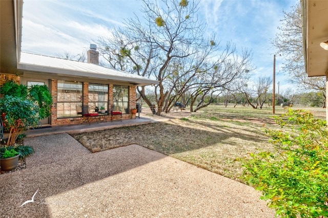 view of yard with a patio