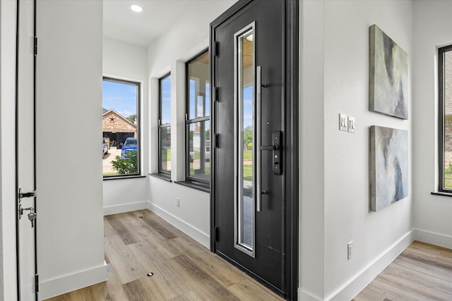 foyer entrance featuring light hardwood / wood-style flooring