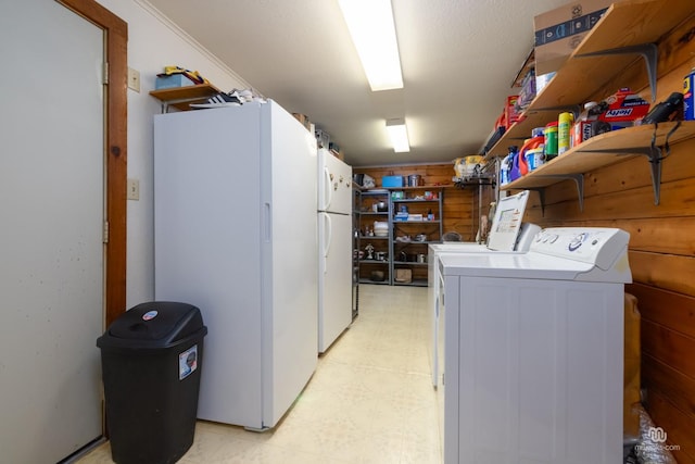 laundry area featuring separate washer and dryer