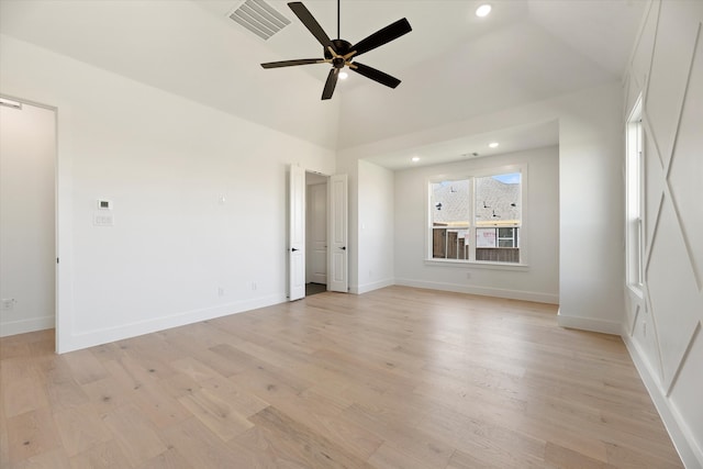 unfurnished room with ceiling fan, light hardwood / wood-style flooring, and high vaulted ceiling