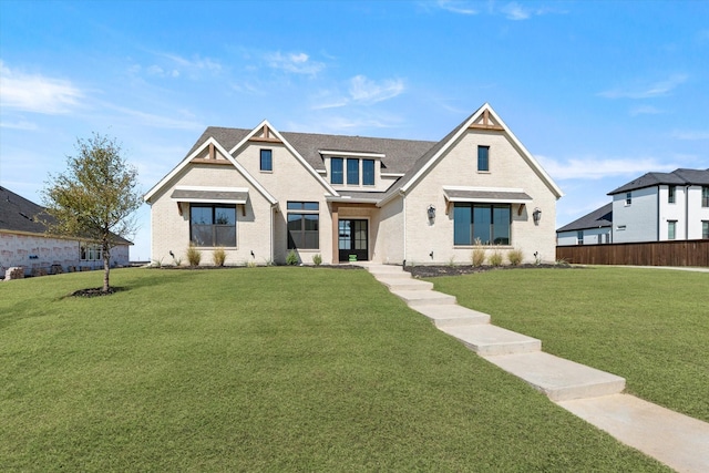 view of front of home featuring a front lawn