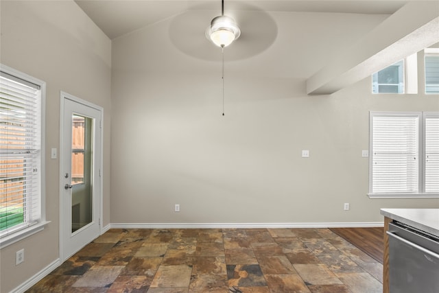 dining space with a wealth of natural light and ceiling fan