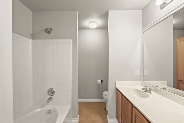 full bathroom with tiled shower / bath combo, tile patterned floors, a textured ceiling, toilet, and vanity