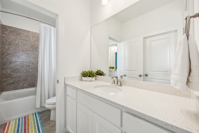 full bathroom featuring vanity, shower / bathtub combination with curtain, and toilet