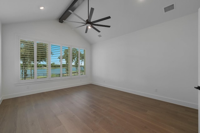 spare room with vaulted ceiling with beams, ceiling fan, and dark hardwood / wood-style flooring