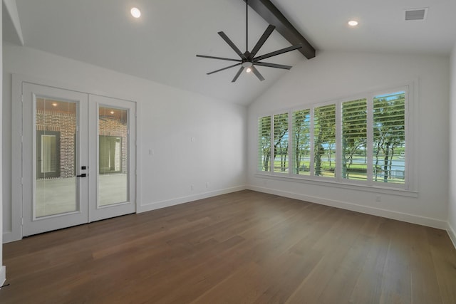 unfurnished room with lofted ceiling with beams, dark hardwood / wood-style floors, a wealth of natural light, and ceiling fan