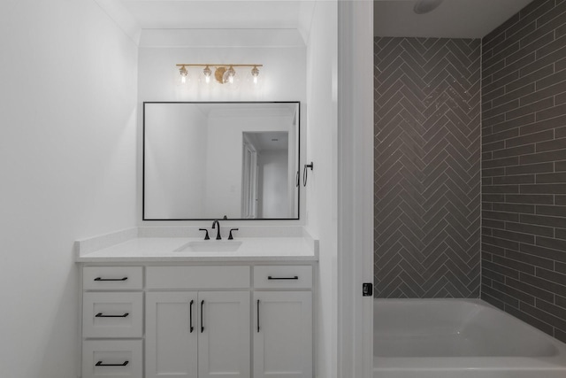 bathroom featuring vanity and tiled shower / bath combo