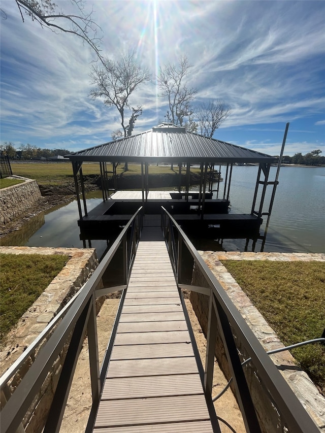 view of dock with a water view