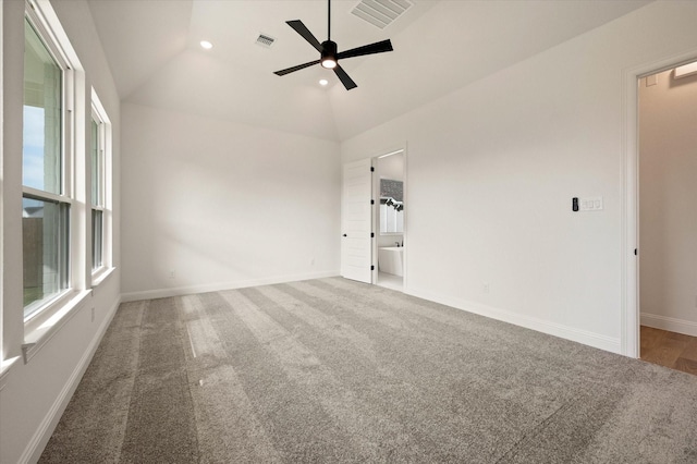 empty room with ceiling fan, carpet, and high vaulted ceiling