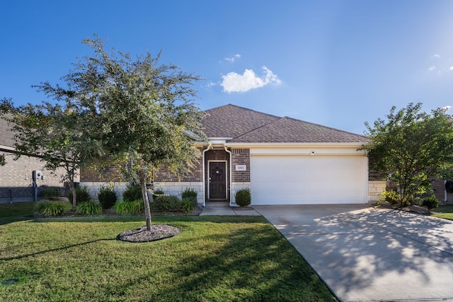 ranch-style house featuring a front yard and a garage