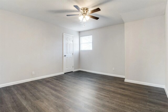 2438 Lea Crest Dr, Dallas, TX 75216 - spare room with a ceiling fan, baseboards, and dark wood-style floors