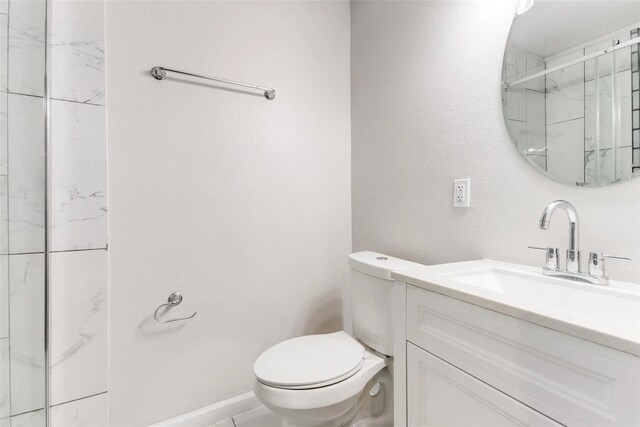 2438 Lea Crest Dr, Dallas, TX 75216 - bathroom featuring vanity, toilet, and a shower
