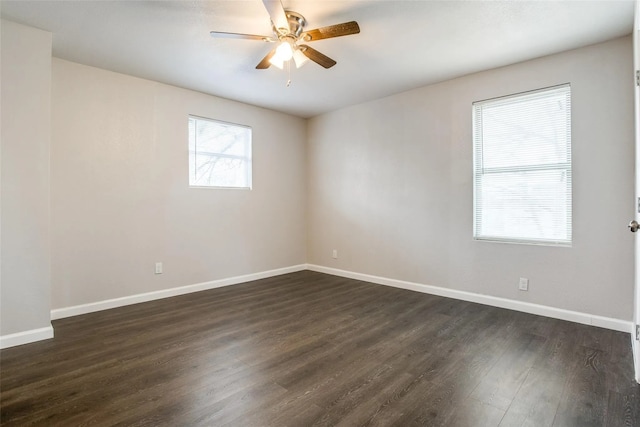 2438 Lea Crest Dr, Dallas, TX 75216 - unfurnished room featuring ceiling fan, dark wood-style floors, and baseboards