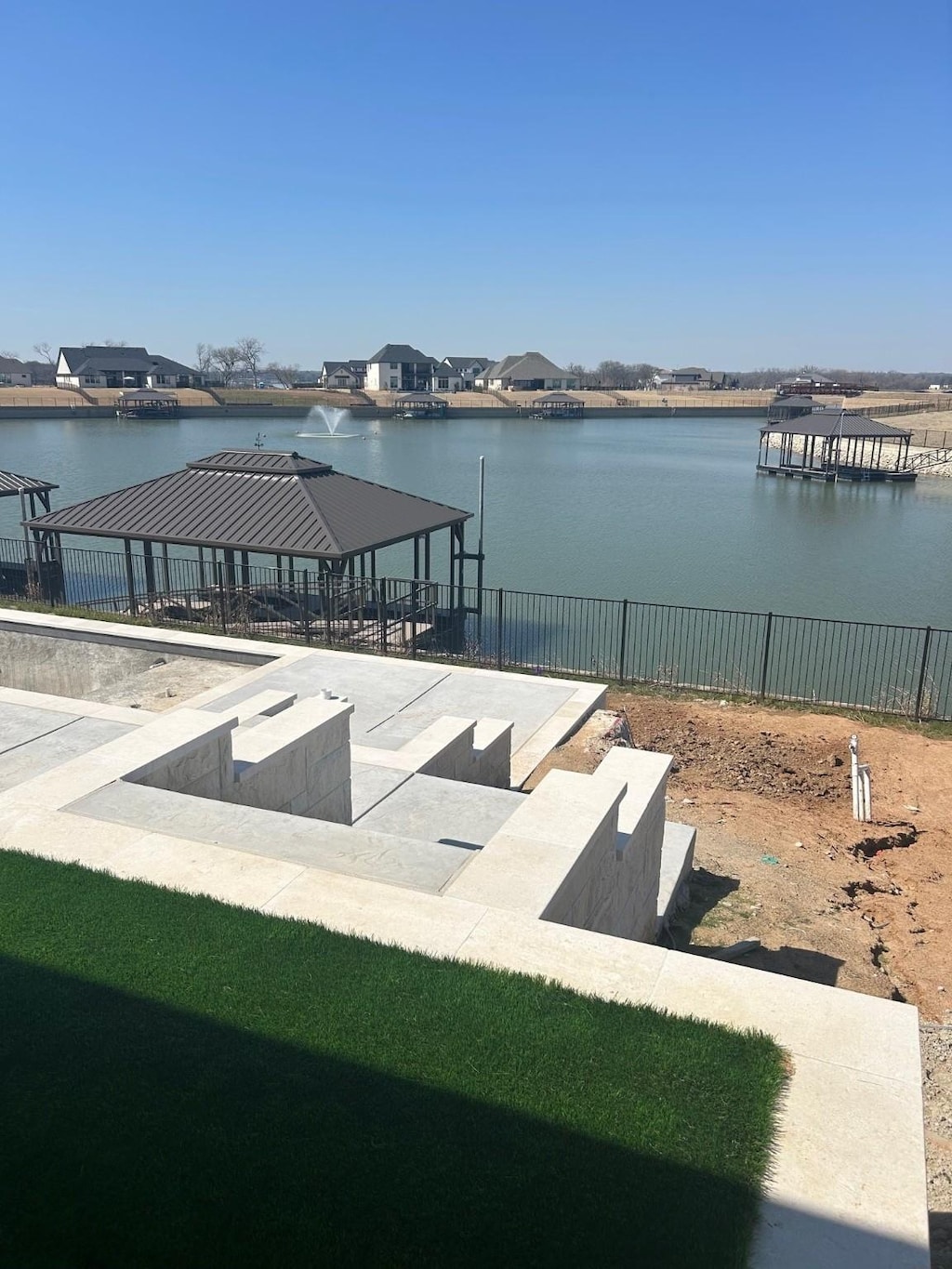 view of water feature featuring fence