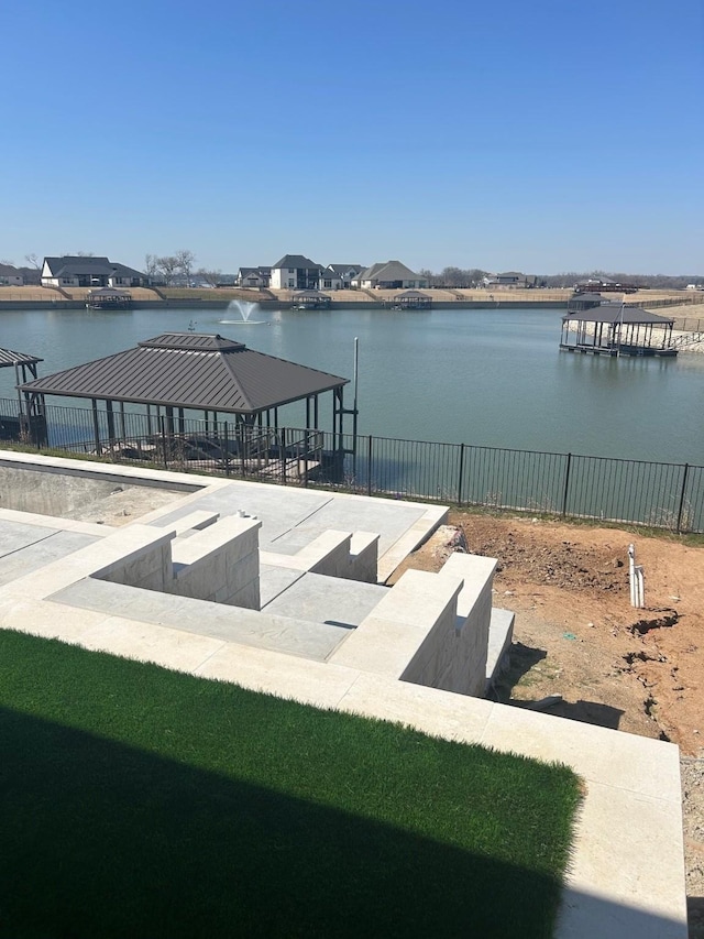 view of water feature featuring fence